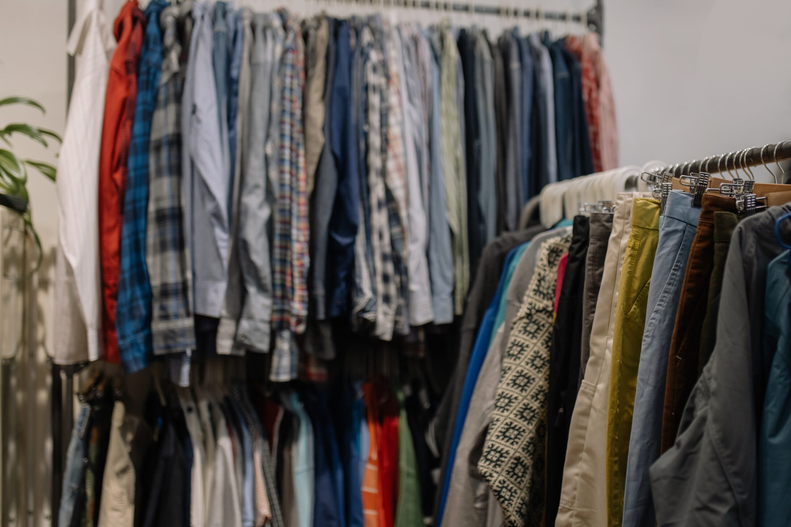 Assorted clothes hanged on a clothing rack